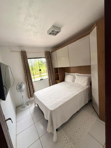 Una cama o camas en una habitación de Casa com piscina no Campo D'Una