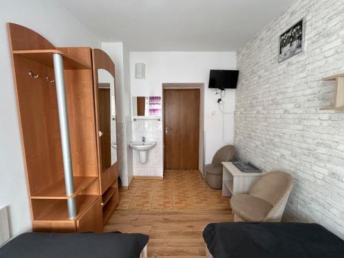 Posezení v ubytování Hotel Wysoka Brama