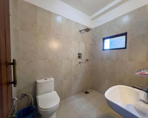 Ένα μπάνιο στο Chitwan Park Village