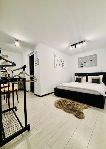 En eller flere senge i et værelse på Cazare centrul vechi Sibiu