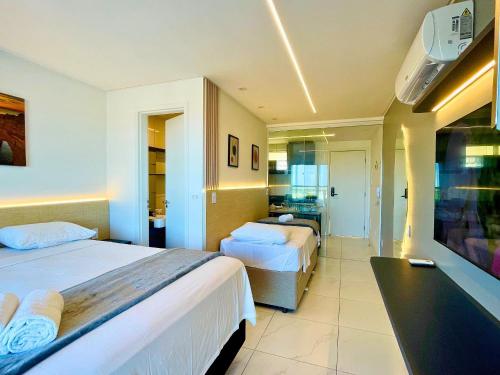 Postel nebo postele na pokoji v ubytování Fortaleza Sul Prime