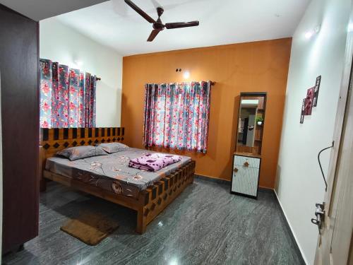 Ένα ή περισσότερα κρεβάτια σε δωμάτιο στο Èclairs Homestay