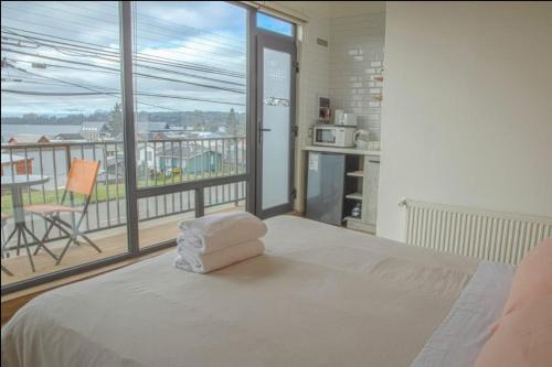 Postel nebo postele na pokoji v ubytování Alto Pehuén