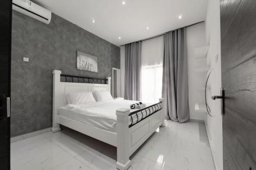 Postel nebo postele na pokoji v ubytování chamis apartment