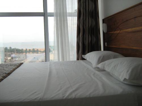 Rosalie's Suitesにあるベッド