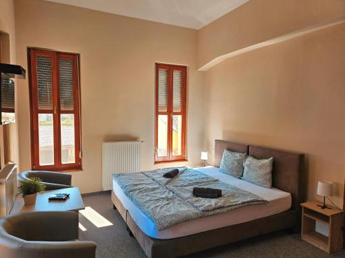 Postel nebo postele na pokoji v ubytování Mediterrán Vendégház