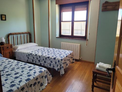 Postel nebo postele na pokoji v ubytování El Encinar