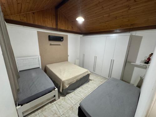 Postel nebo postele na pokoji v ubytování Casa completa perto da praia