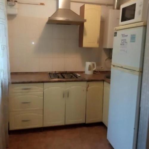 Η κουζίνα ή μικρή κουζίνα στο Мономаха 27 Центр