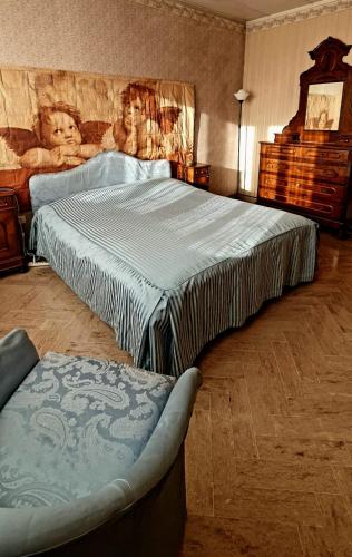 Postel nebo postele na pokoji v ubytování Il Rifugio di Nonna Edy