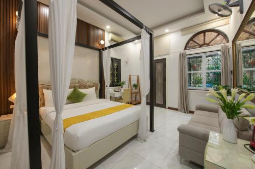 Ένα ή περισσότερα κρεβάτια σε δωμάτιο στο Hanoi Family Homestay