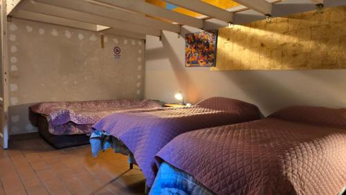 Postel nebo postele na pokoji v ubytování La Casa di Daniele