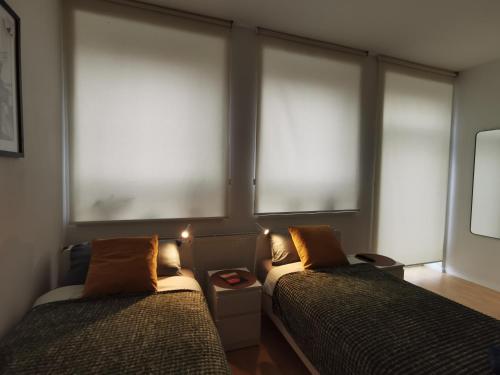 Ένα ή περισσότερα κρεβάτια σε δωμάτιο στο Appartement direkt am Fluss Nähe Zentrum