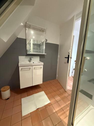 Koupelna v ubytování Duplex de charme Quimpérois Place Saint-Corentin