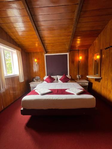 Ένα ή περισσότερα κρεβάτια σε δωμάτιο στο The Groot