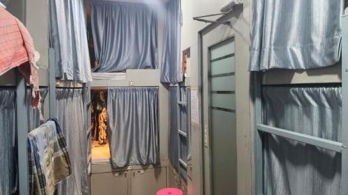 Ένα μπάνιο στο New Restinn Dormitory Hostel