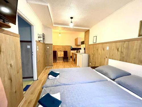 Ένα ή περισσότερα κρεβάτια σε δωμάτιο στο Kael Apartment 2