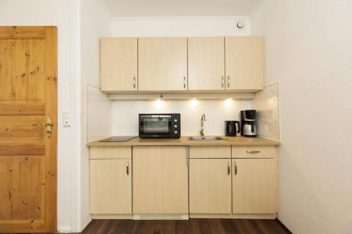 Η κουζίνα ή μικρή κουζίνα στο Marina Wendtorf Seeräuber