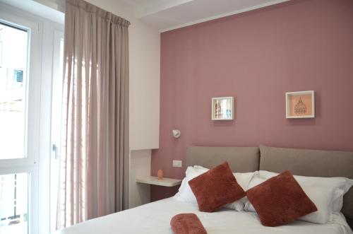 Postel nebo postele na pokoji v ubytování Vatican View Experience