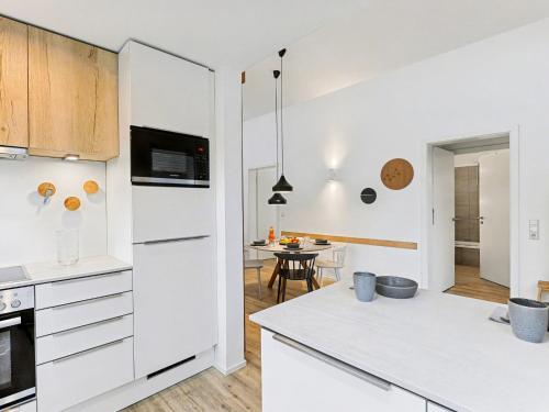 Η κουζίνα ή μικρή κουζίνα στο Holiday Home Küstenzauber by Interhome