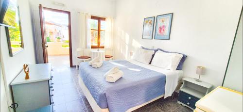 Ένα ή περισσότερα κρεβάτια σε δωμάτιο στο Knossos Sunset