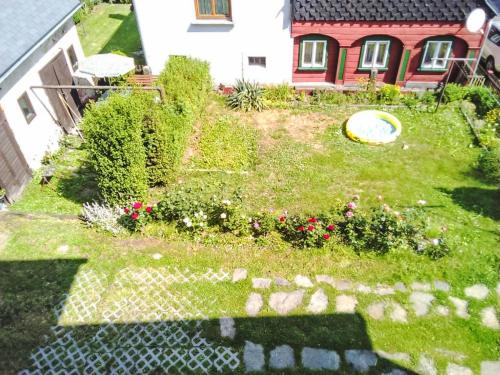 an aerial view of a yard with a frisbee at Apartment Jiřetínská chaloupka by Interhome in Jiřetín pod Jedlovou