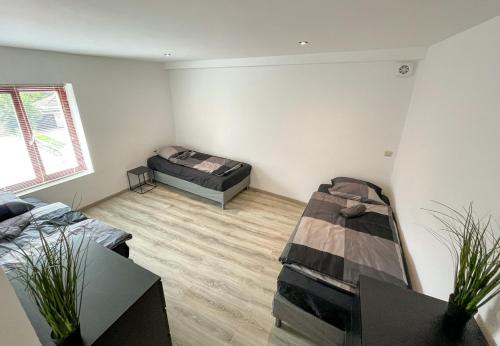 Postel nebo postele na pokoji v ubytování 78-3 - Apartment in Weener for 3 guests