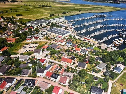 an aerial view of a town with a marina at Kröslin Apartments in Kröslin