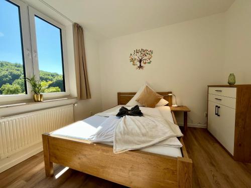 Ένα ή περισσότερα κρεβάτια σε δωμάτιο στο Aparthotel Tannenhof