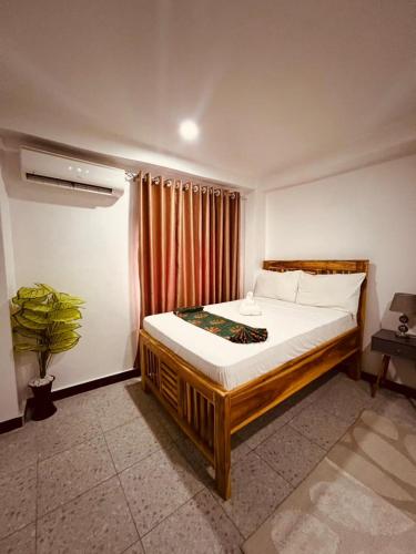 Ένα ή περισσότερα κρεβάτια σε δωμάτιο στο Studio Room