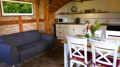 Kuchyň nebo kuchyňský kout v ubytování 75 qm Ferienwohnung für 4 Personen am Naturschutzgebiet Anklamer Stadtbruch