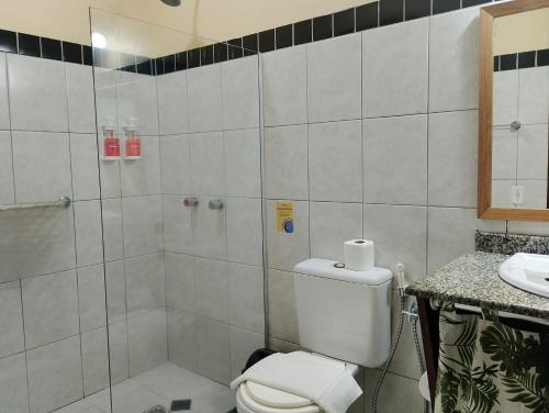 Koupelna v ubytování Porto Zarpa Hotel