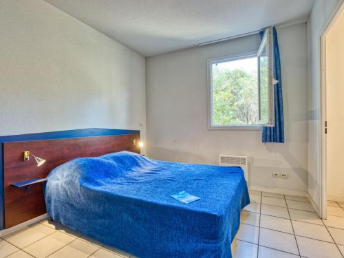 En eller flere senge i et værelse på Holiday Home Marina de Talaris by Interhome