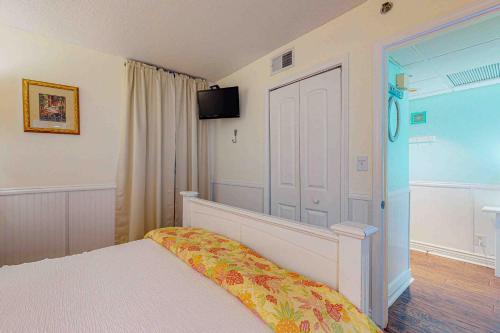 En eller flere senge i et værelse på Sunbird W204