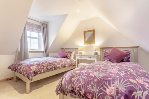 En eller flere senge i et værelse på 2 Bed in Big Sand oc-d33686