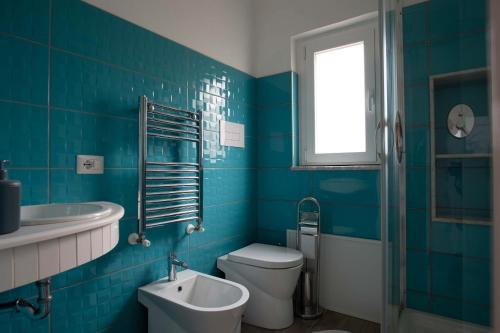 Et badeværelse på Villetta San Leone con giardino