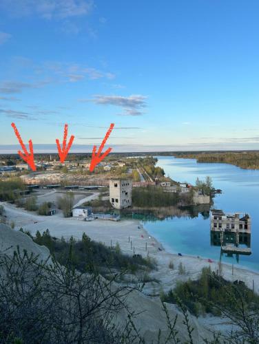 a view of a body of water with two x at Rummu Holiday Home in Rummu