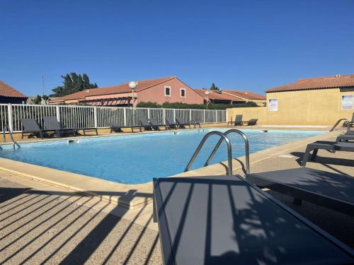 Pavillon T3 climatisé, piscine et parking