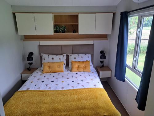 Ένα ή περισσότερα κρεβάτια σε δωμάτιο στο B&B Landlust