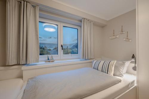 Postel nebo postele na pokoji v ubytování Süder16