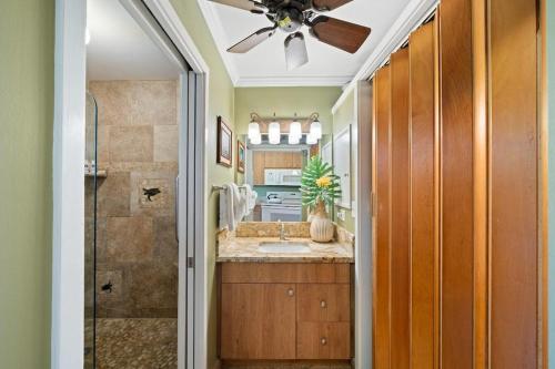 a bathroom with a sink and a shower at Napili Bay 210 · NB 210 Napili Bay Studio with Direct Ocean View in Kahana