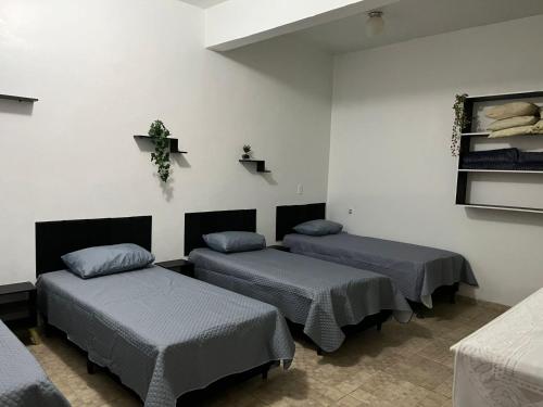 Voodi või voodid majutusasutuse Espaço Ideal 2 toas