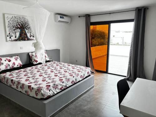 Postel nebo postele na pokoji v ubytování Villa Kër Girafes 3 bedrooms, 3 double beds, Somone