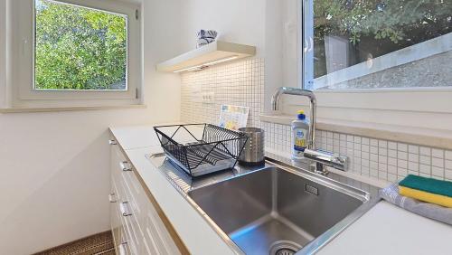 Kuchyň nebo kuchyňský kout v ubytování Studio Meratti Gorinka