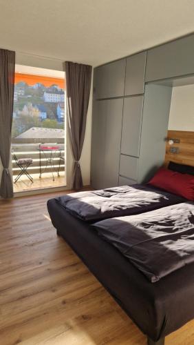 Ένα ή περισσότερα κρεβάτια σε δωμάτιο στο Apartment Schwarzwaldtraum