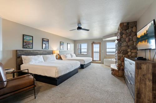 Postel nebo postele na pokoji v ubytování Quarterdeck Resort