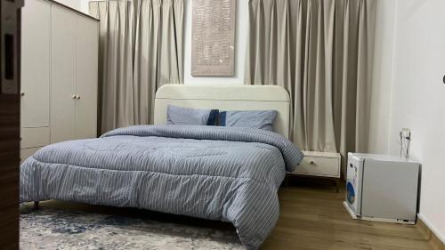 Ένα ή περισσότερα κρεβάτια σε δωμάτιο στο المسارات الدولية International Routes