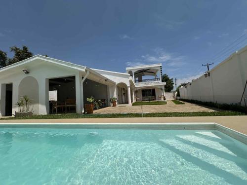 Bazén v ubytování Mora Mora Cozy Villa nebo v jeho okolí