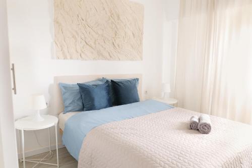 Ένα ή περισσότερα κρεβάτια σε δωμάτιο στο Apartment with sea view in Cullera