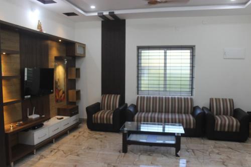 Гостиная зона в Cozy Villa